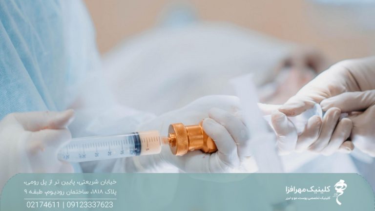 پزشکی که چربی بدن فرد را وارد یک سرنگ کرده است